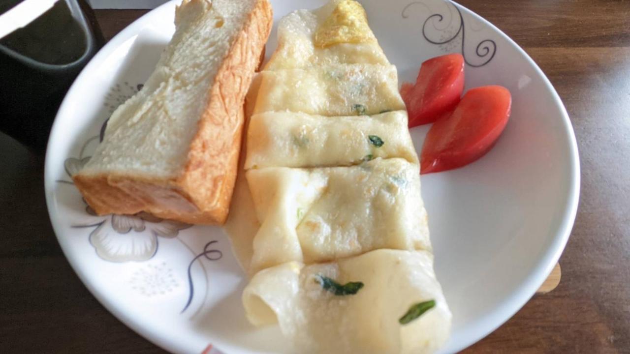 Yu Hai B&B Джиаоси Екстериор снимка